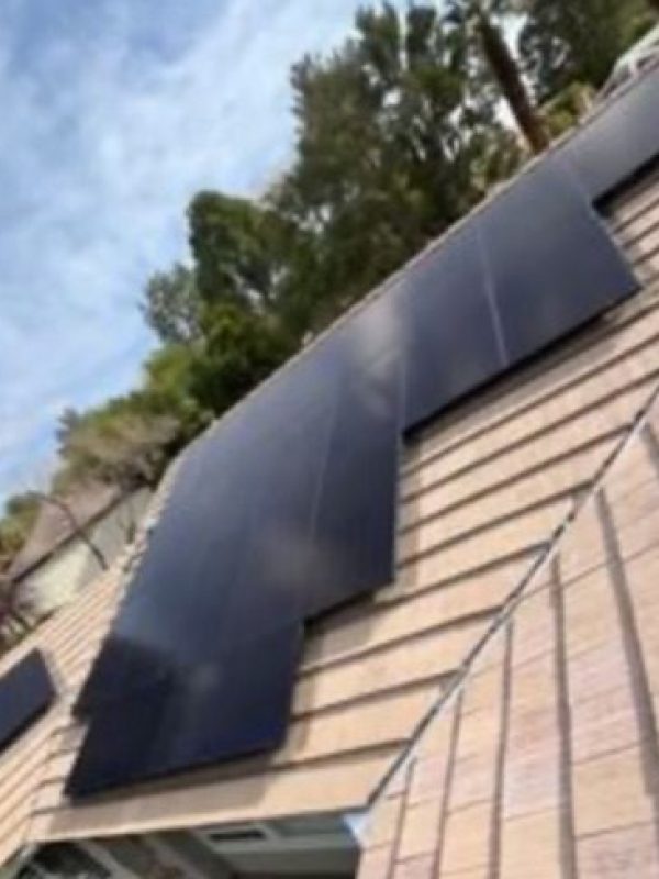Solar panels installed on a house roof.