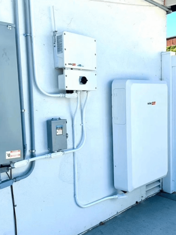 Solar power equipment mounted on exterior wall.